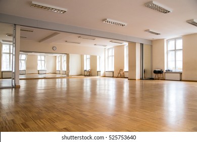 Bright Dance Hall In Dance School With White Walls