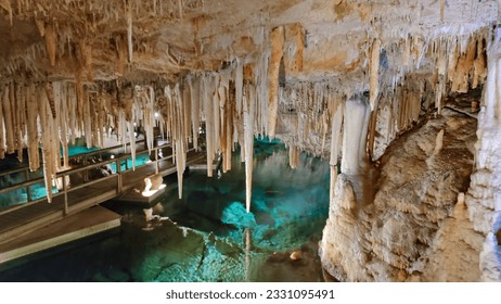 Bright decoration of stalagmites and stalactites in karst cave