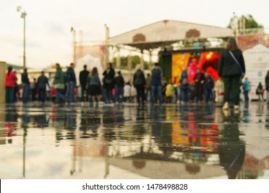 Bright Defocused photo of people on the city festival. Indian Culture Day in Moscow on a summer rainy day. Unrecognizable faces. - Shutterstock ID 1478498828