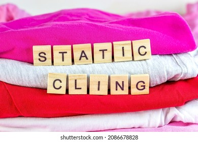 Bright Dry Stack Of Clothes With Wooden Words Static Cling