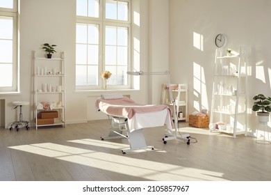 Bright empty cosmetology cabinet in modern beauty clinic. Interior of beautician room in aesthetic medicine salon. Medical office of dermatologist specialist. Cosmetic, skincare saloon treatment. - Shutterstock ID 2105857967