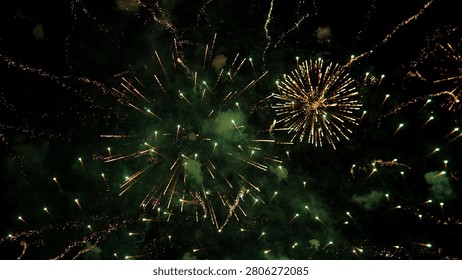 Bright fireworks explode across dark sky with golden streaks, glowing smoke clouds, vivid spark trails, scattered starbursts, vivid color, and lively festive celebration scene at