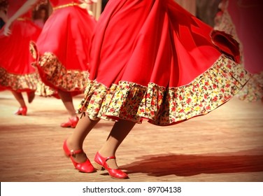 Bright Fragment Of Fast Russian Folk Dance With Red Girls Waved Skirt