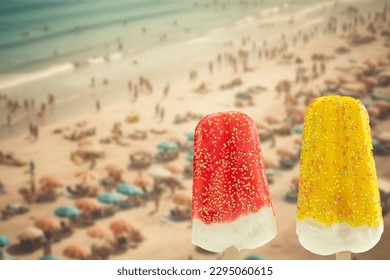 Bright fruit ice cream on a stick on a summer concept background. Frozen fruit ice. Summer mood. Cooling dessert in hot weather. Favorite delicacy for children. Homemade raspberry, strawberry, 