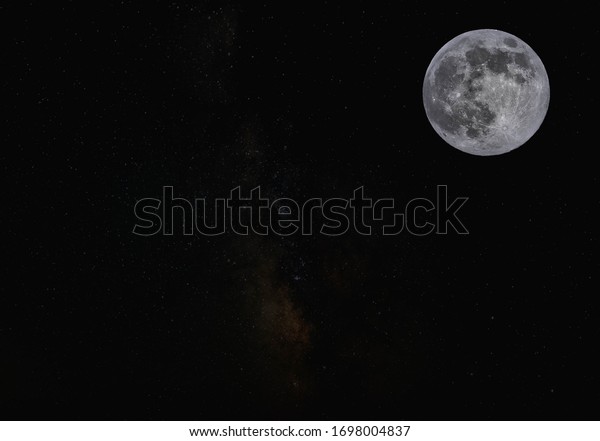 Bright full moon with stars in the background.\
Composite image