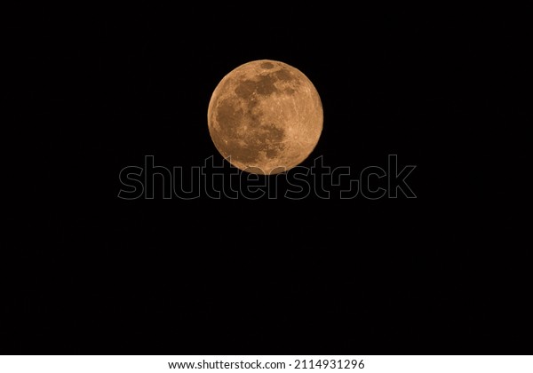 Bright full wolfs moon at\
night
