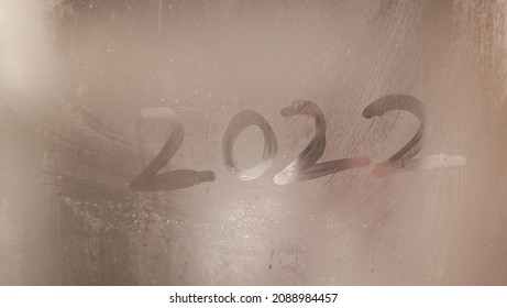 Bright Future In The Coming Year Concept. 2022 Drawn On Mirror In Steamy Bathroom