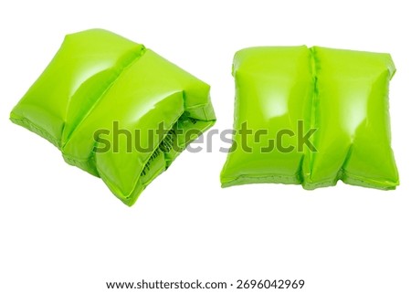 Bright green inflatable arm floaties for swimming safety