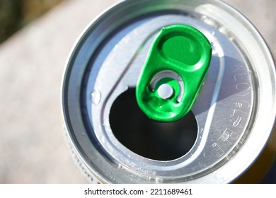 Bright Green Pull Tab On Aluminium Can