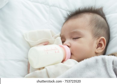 Bright hold bottle feeding baby bottle - Powered by Shutterstock