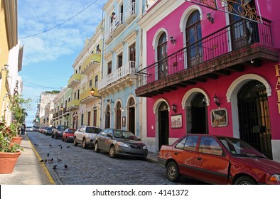 Bright houses line a cobblestone street in Old San Juan, Puerto Rico