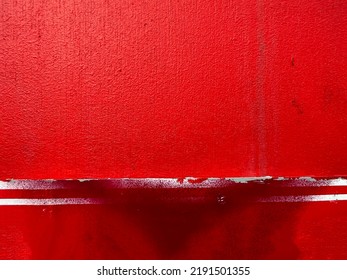 Bright Intense Red Colour Painted Urban Wall With Street Sign Edge And Graffiti Spray Paint Texture 