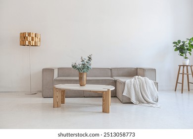 bright interior design of spacious living room with white walls and decorative unique historical moldings on ceiling stylish modern furniture in warm colors without people daylight through the windows - Powered by Shutterstock