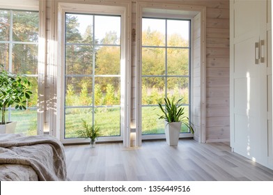 Bright interior, room in wooden house with large window. Scandinavian style. - Shutterstock ID 1356449516