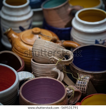 Similar – Foto Bild viele teil bunte Eimer aus Blech auf dem Flohmarkt