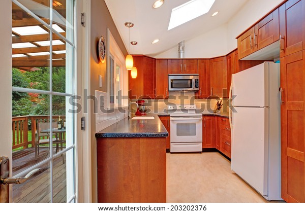 Bright Kitchen Room Vaulted Ceiling Skylight Stock Photo