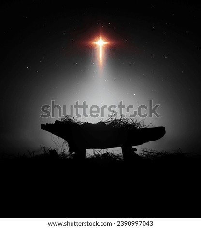 A bright and large star shines brightly, blessing baby Jesus in the manger in the stable, a background that celebrates Christmas and the birth of Jesus and his death on the cross.
 Сток-фото © 