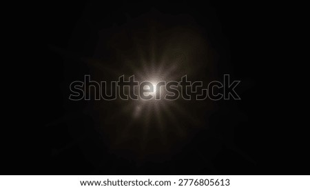 A bright light source emanating from darkness, creating a lens flare effect, perfect for abstract or conceptual designs.