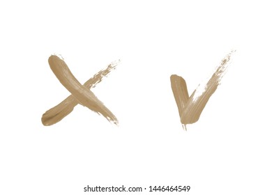 Bright liquid lipstick smear in the form of a check mark and cross isolated on a white background. Cosmetic product stroke. Yes sign for checkbox. Brown color