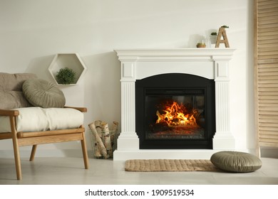 Bright living room interior with fireplace and basket of firewood