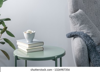 Bright Living Room Interior With Grey Green Metal Side Table And Grey Fabric Sofa