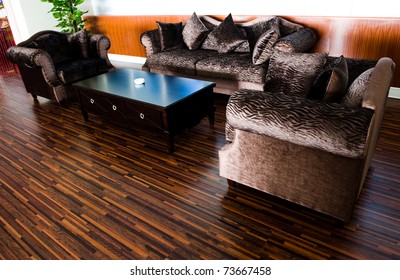 Bright Modern Interior Design With Hard Wood Flooring.