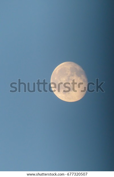 Bright moon beautiful on\
background blue sky,Suitable for design background events and\
festivals