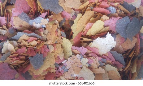 Bright Multi-colored Flakes Of Fish Food