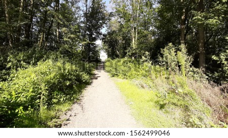 Similar – Zwei Menschen wandern auf einem Berg