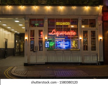 Bright Neon Light Sign Of A Bar Down Rathbone Place In Fitzrovia. London - 5th December 2019