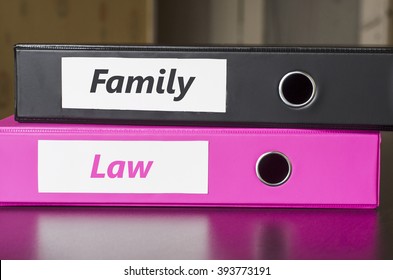 Bright Office Folders Over Dark Background And Family Law Text Concept