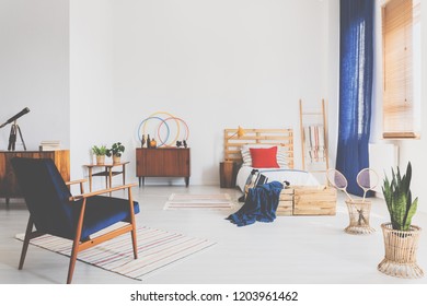 Bright Oldschool Teenager Bedroom With Vintage Furniture, Real Photo With Copy Space On The Wall