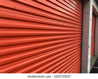 Bright Orange Metal Roll Up Doors Used In Climate Controlled Self Storage Units