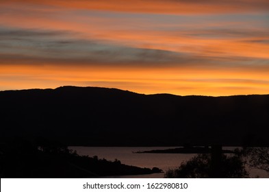 Bright Oranges Sunset By The Jindabyne Lake In The Snowy Mountains Australia