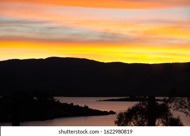 Bright Oranges Sunset By The Jindabyne Lake In The Snowy Mountains Australia