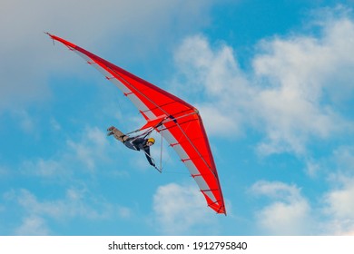 Bright paraglider wing in the sky. Extreme sports