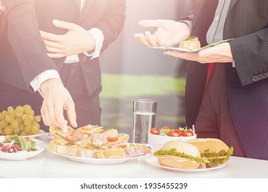 Bright Photo Of Two Businessmen During Outdoor Business Lunch