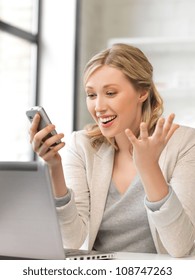 bright picture of businesswoman with cell phone - Shutterstock ID 108747263