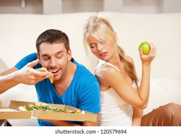 bright picture of couple eating different food (focus on man)