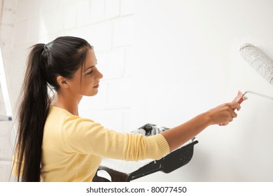 Bright Picture Of Lovely Housewife Painting At Home