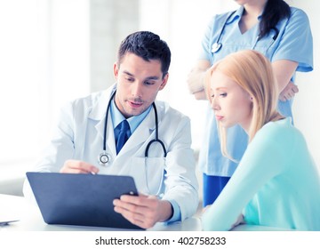 Bright Picture Of Male Doctor With Patient