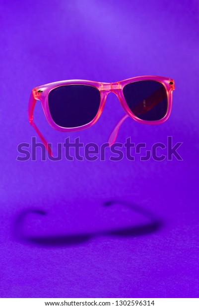 bright pink sunglasses