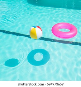 pink and blue beach balls