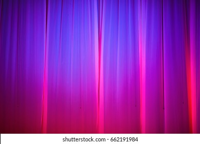 Bright Pink And Purple Stage Curtain With Spotlight. Abstract Background.