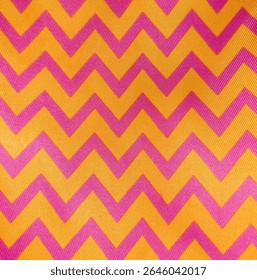 Bright Pink Zigzag Pattern on Yellow Fabric – Vibrant Textile Background