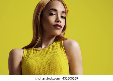 Bright Portrait Of A Black Woman Wears Bright Yellow Dress
