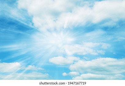 Bright rays shining in clouds