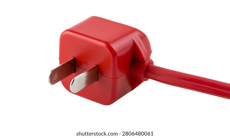 Bright red electrical power plug with two metal prongs and attached cord