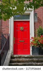 Bright Red Front Door Of House