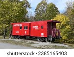 Bright red, parked train car 